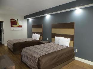 Grand Villa Inn & Suites Chinatown Houston Room photo